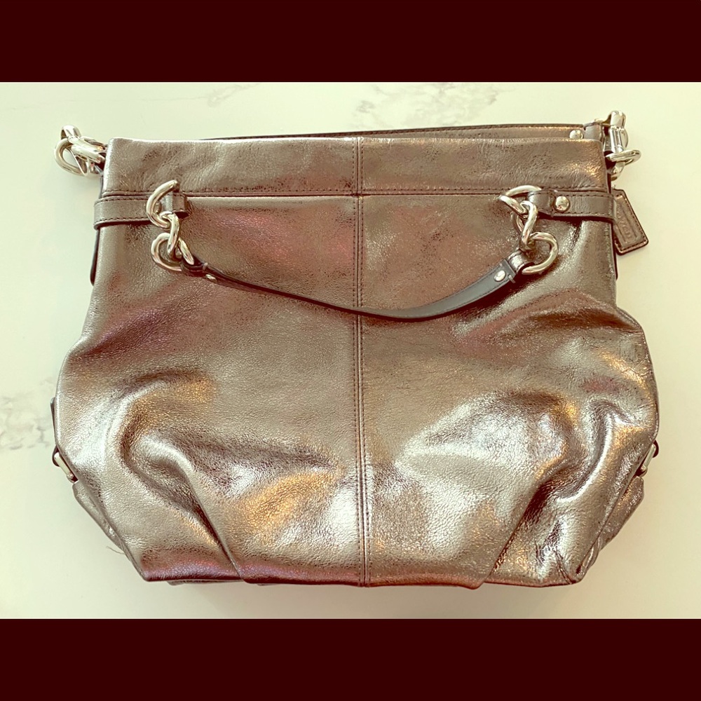 Metallic silver Coach purse never used.